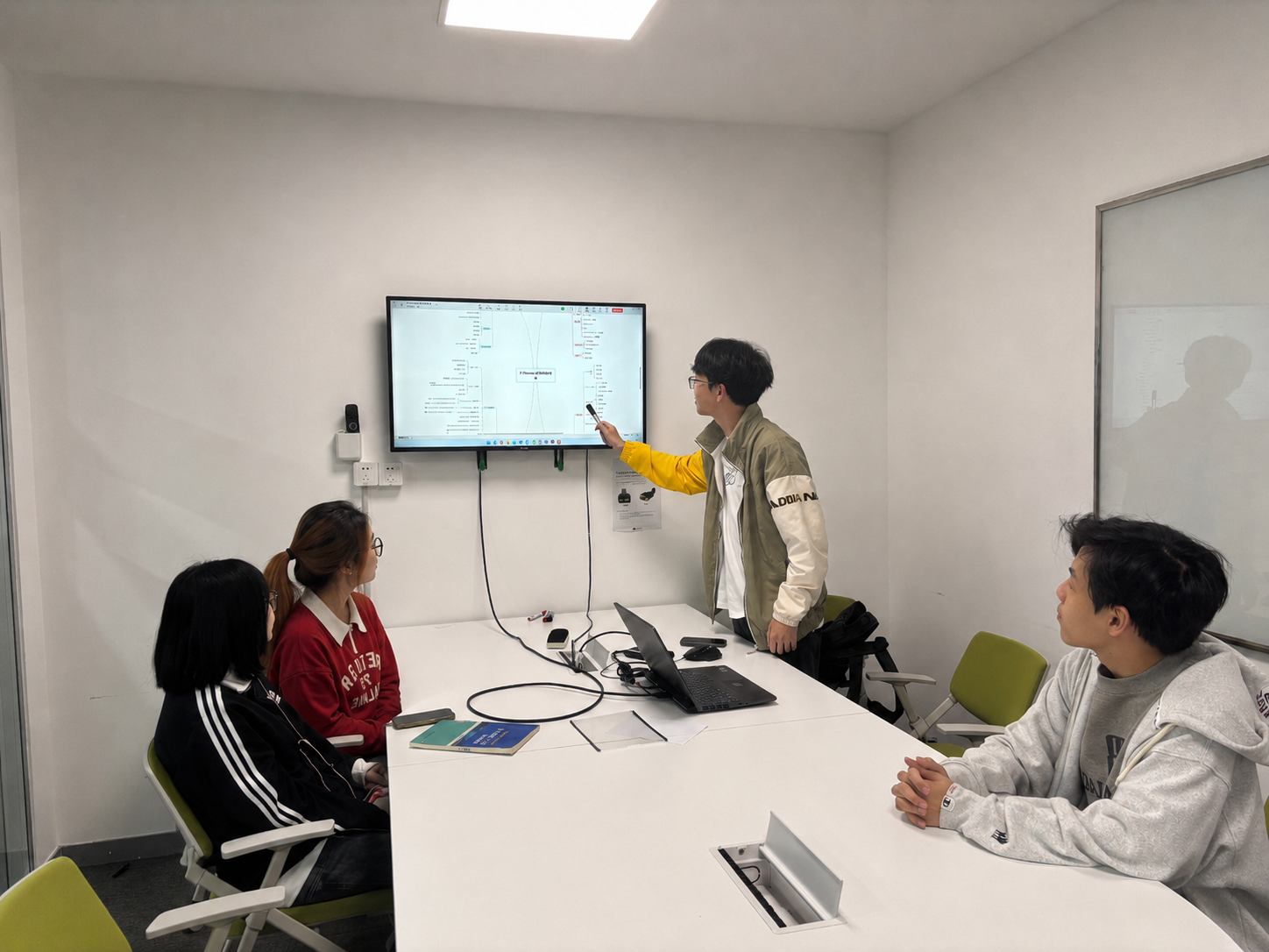 Team brainstorming with sticky notes on whiteboard